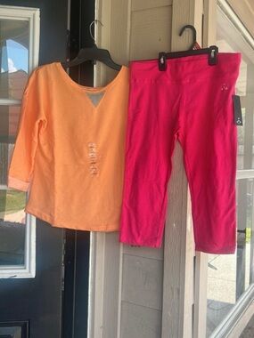 Women’s Athletic sports set Capri Shorts - Pink and a thee quarter sleeve blouse